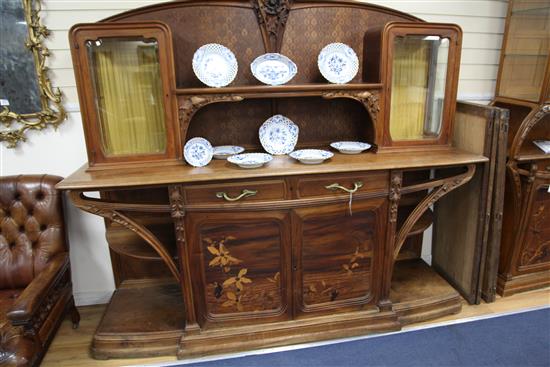 A Louis Majorelle Chicoree pattern walnut and marquetry buffet, W.7ft 4in. D.1ft 10in. H.6ft 6in.